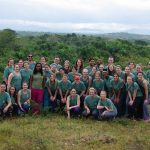 Students and faculty on a hill in the Dominican Republic