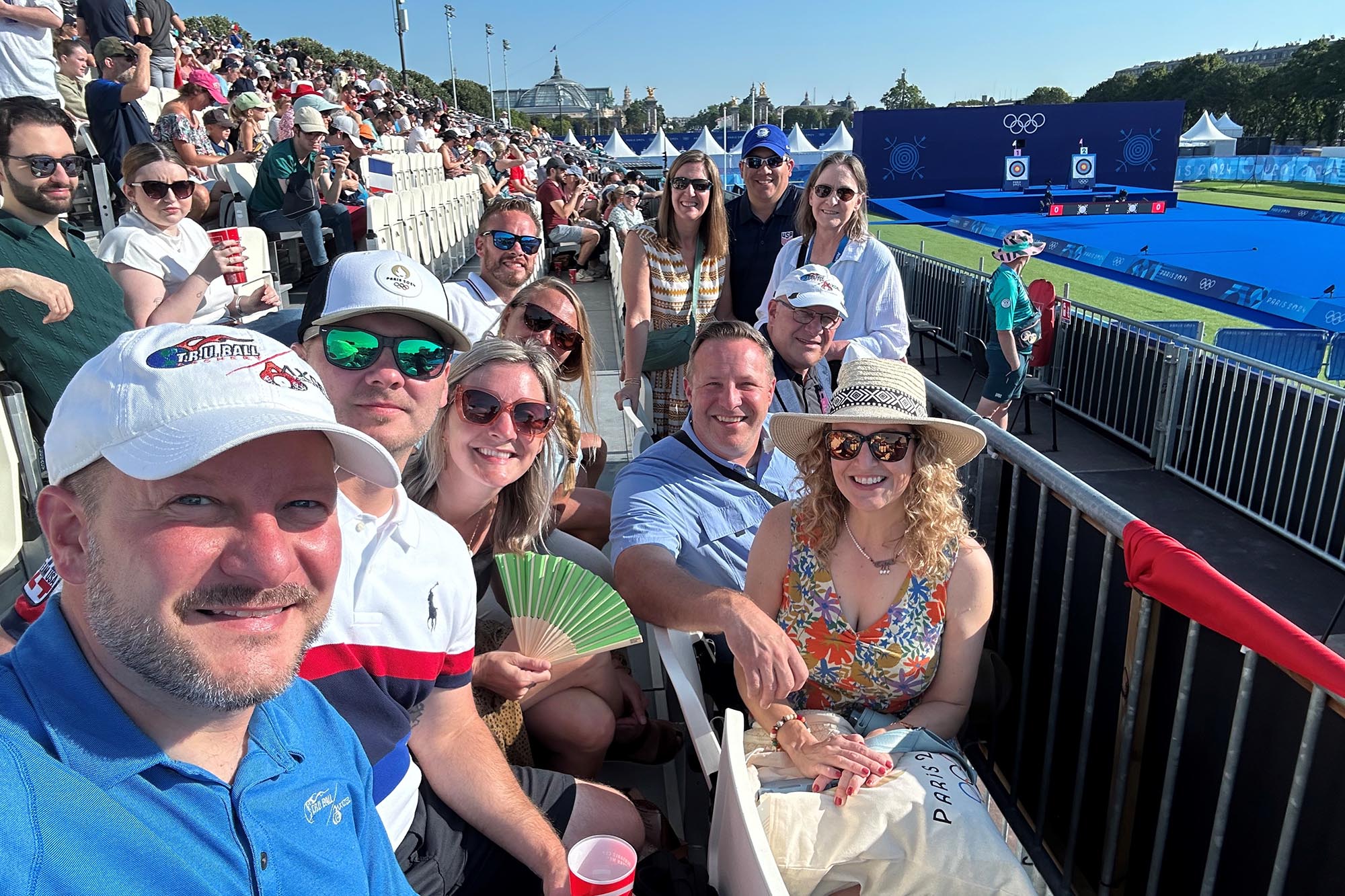 The Summerses and team members from T.R.U. BAll/AXCEL Archery attending an archery event at the 2024 Paris Olympics.