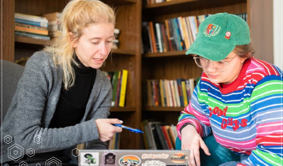 Kelly Jacobson, Assistant Professor of English, works one-on-one with a University of Lynchburg student.