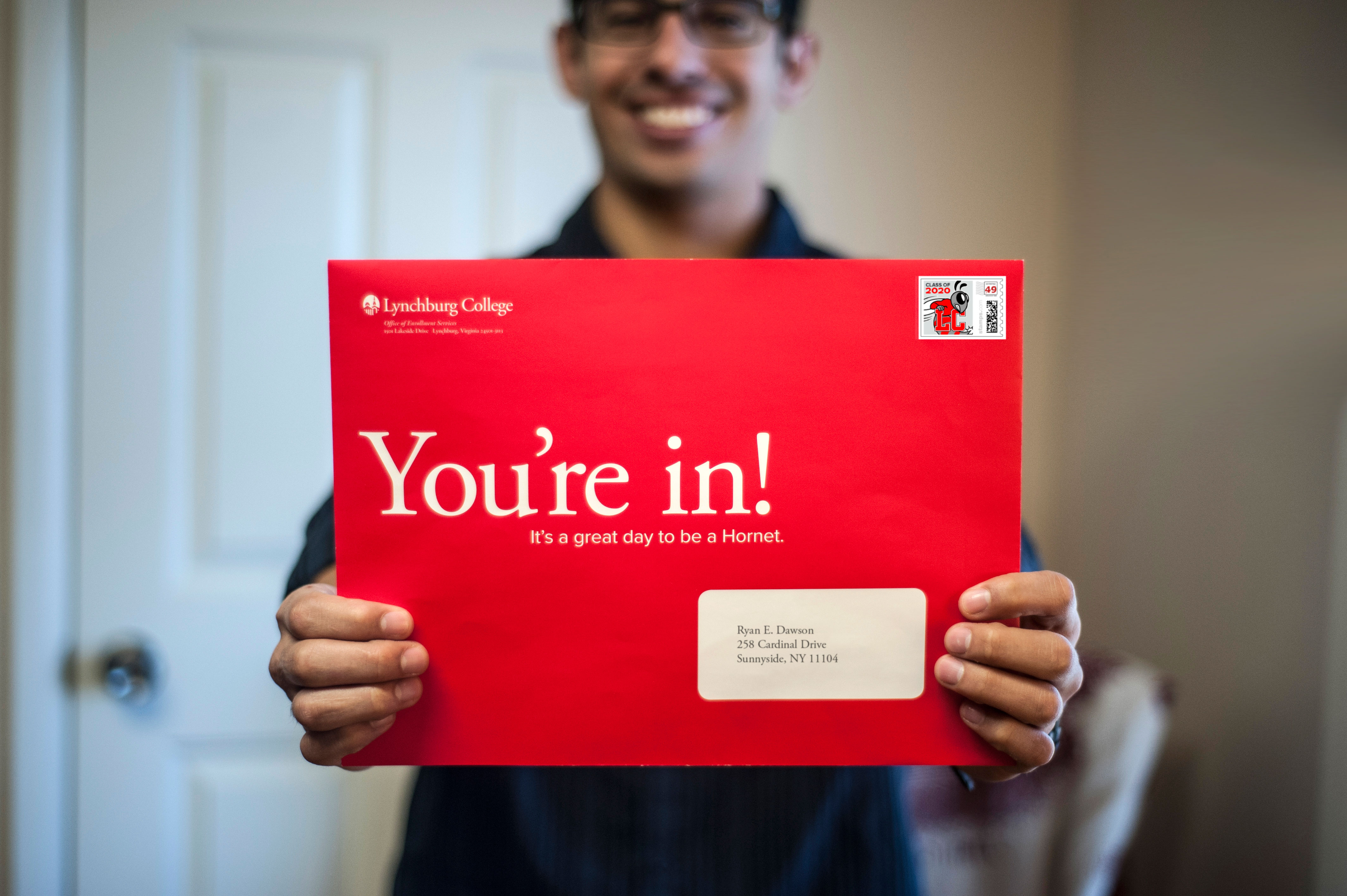 Future enjoy acceptance letters in big, red envelopes